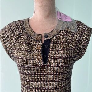 CHANEL Elegant Black and Gold Dress